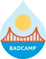 A Sun over an illustration of the golen gate bridge, over the word BADCAMP in the blue of the ocean, all within the shape of a drop